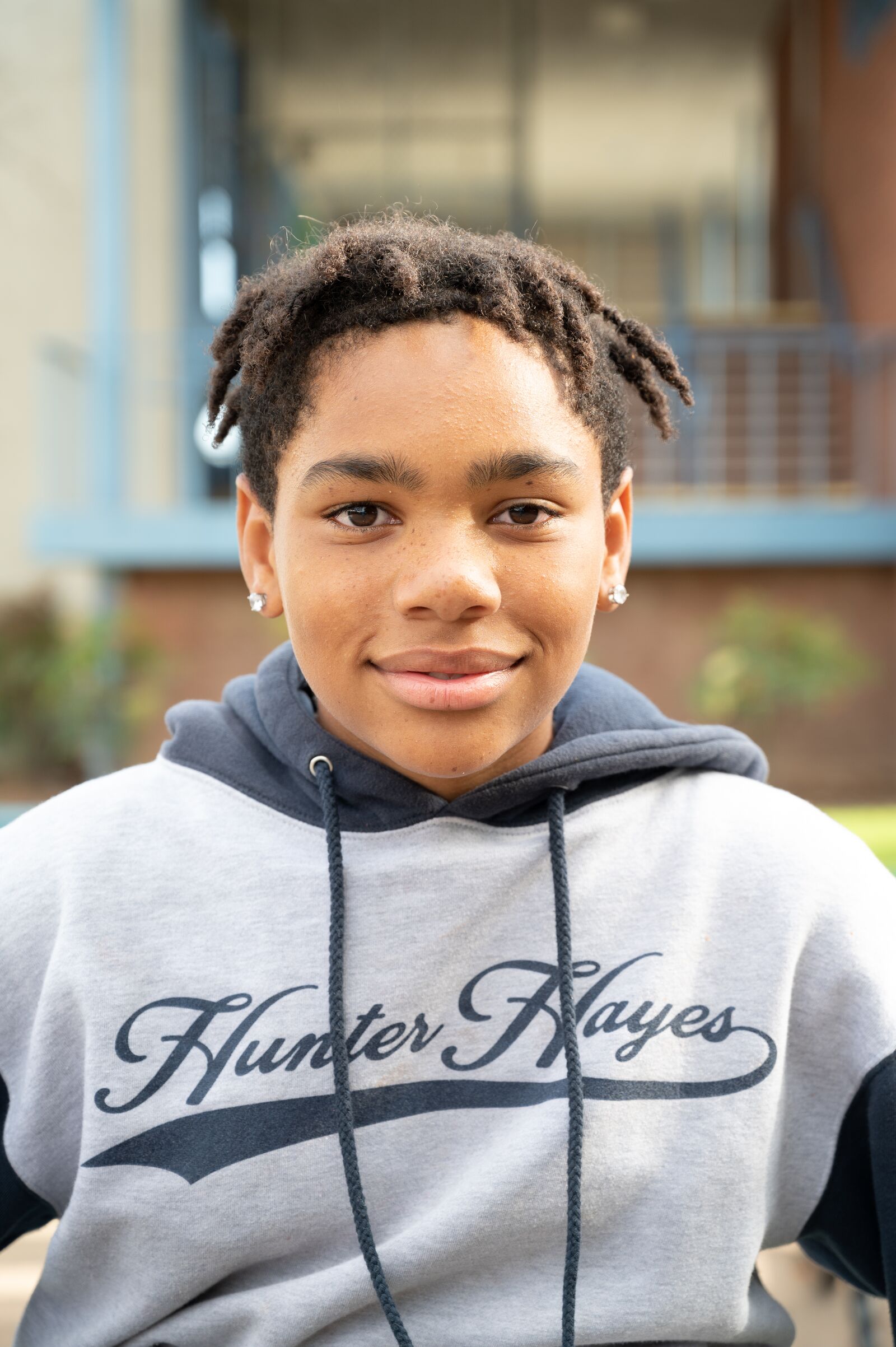 Architects of Hope participant wearing a branded sweatshirt