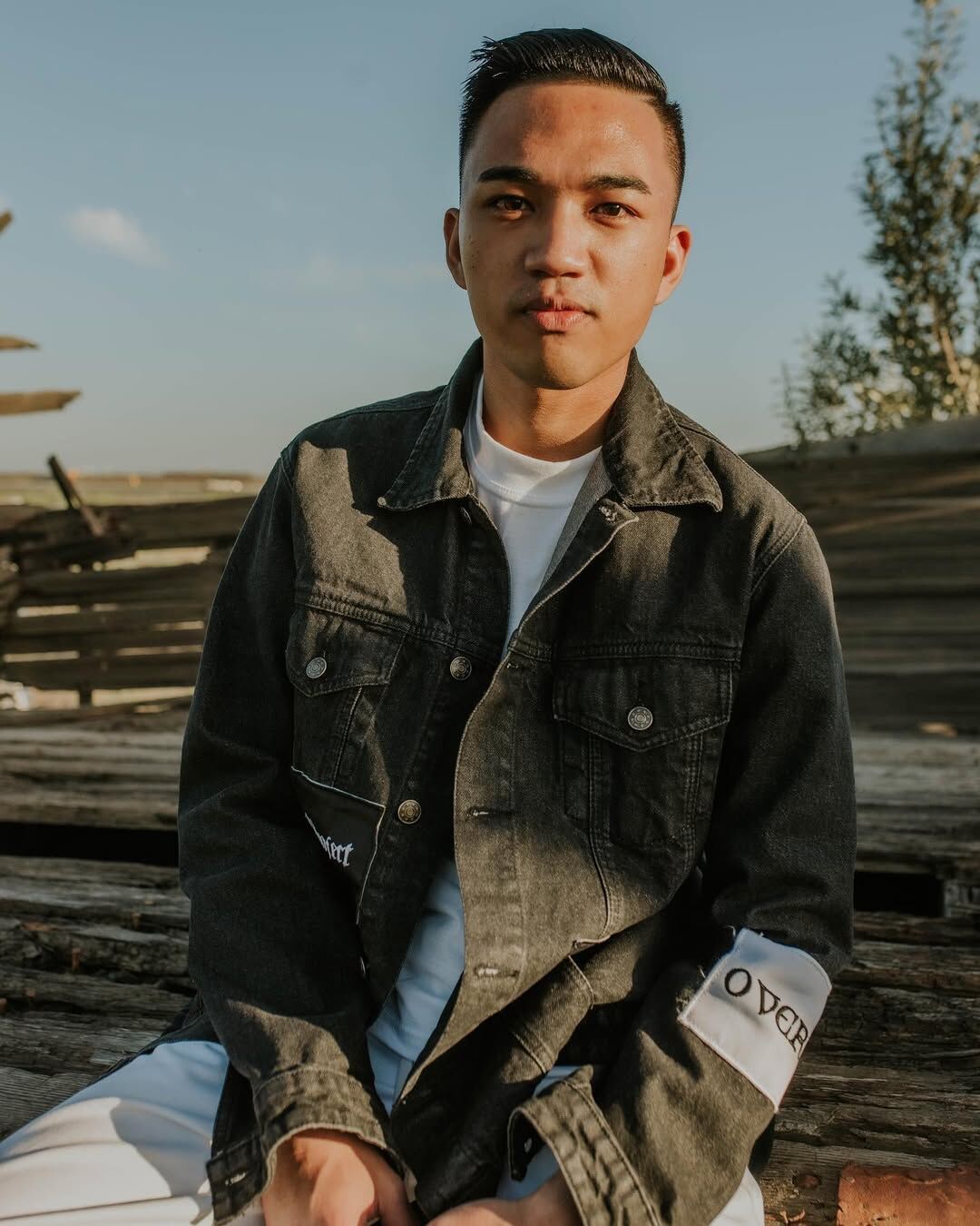Model in layered Project Church apparel